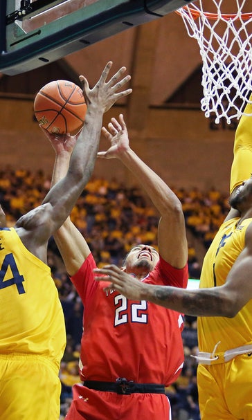 McBride leads No. 17 West Virginia over No. 22 Texas Tech